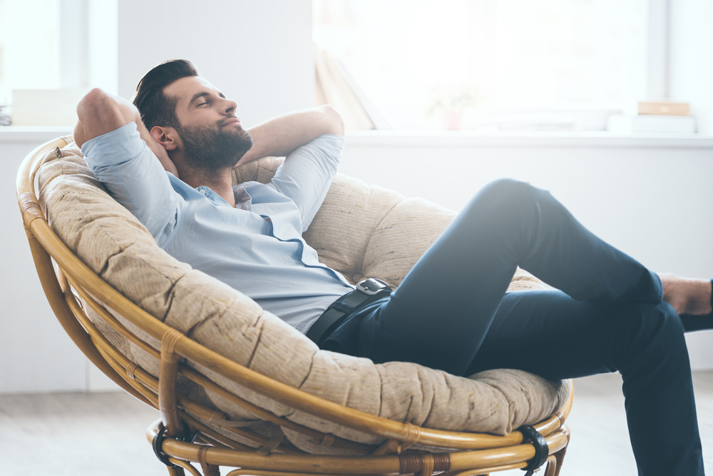Man enjoying comfy home with cool roof system